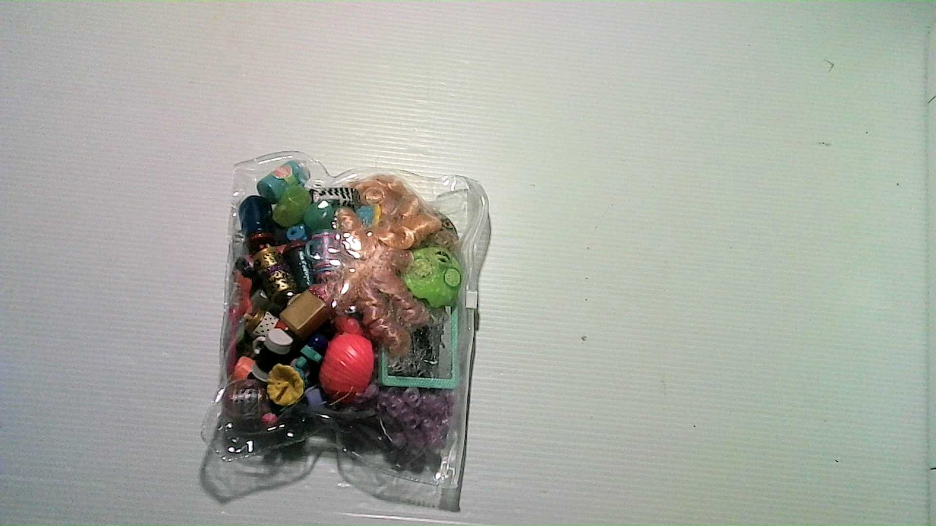 A bag of rubber toy parts