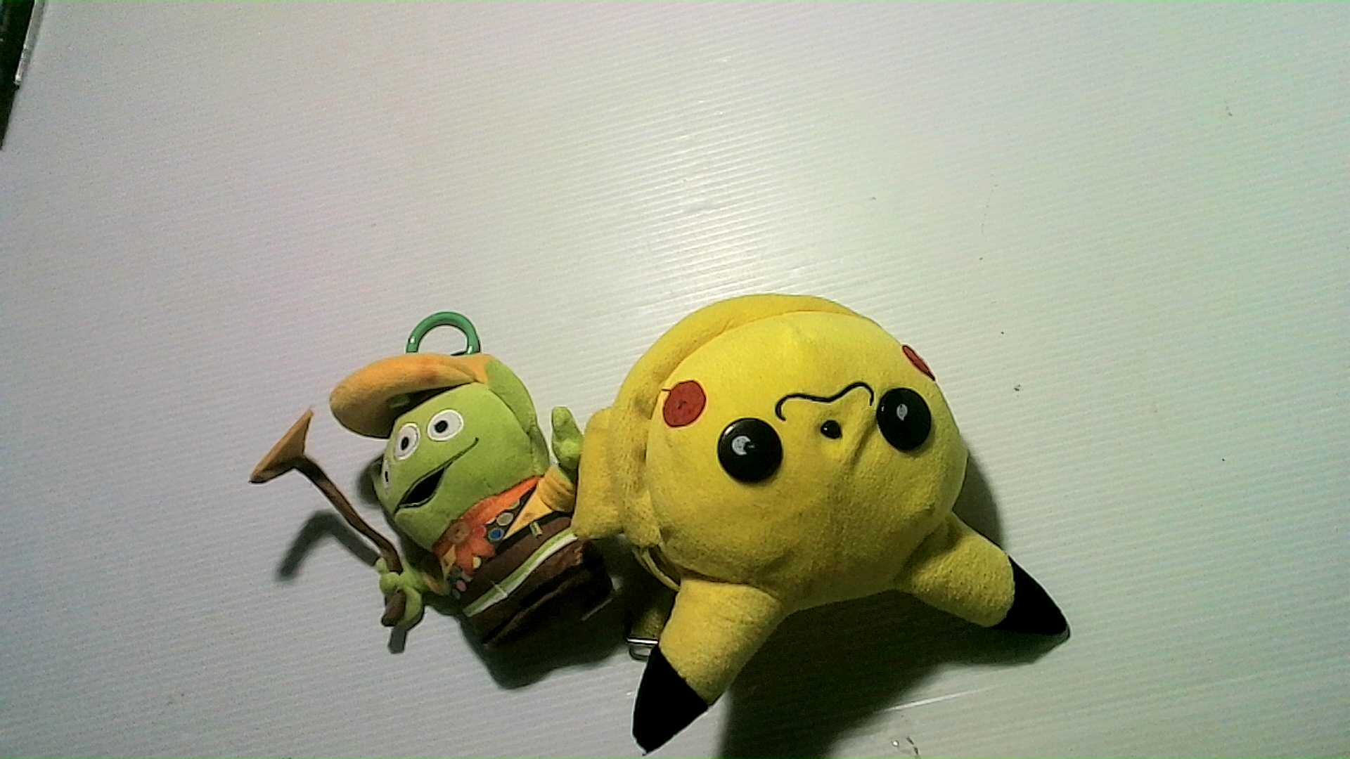 Plush Toys: Alien and Pikachu